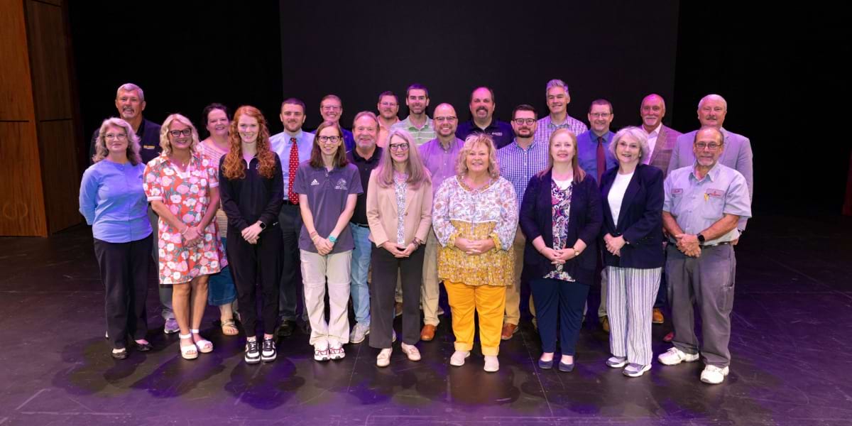 Group of FHU faculty and staff being recognized for their years of service.