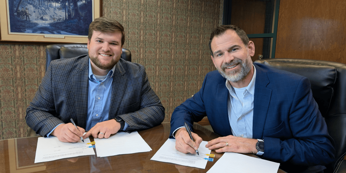 FHU alumni Jay Dryden (right) hired Nick Jackson (left) as an intern in 2018. Jackson is now a senior partner at Vector Wealth Strategies.