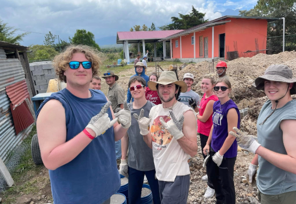 Group photo of FHU Students working outside