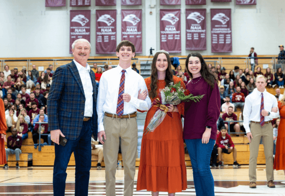 David Shannon with the Homecoming Queen and King