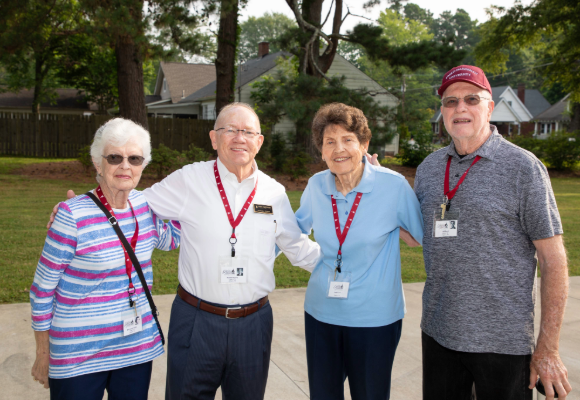Golden Year reunion group of four alumni