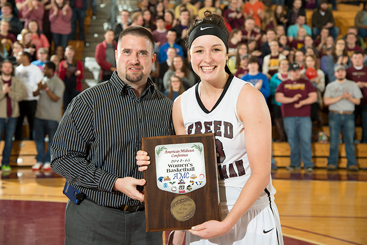 Olympic silver medalist Grace Alonso with award