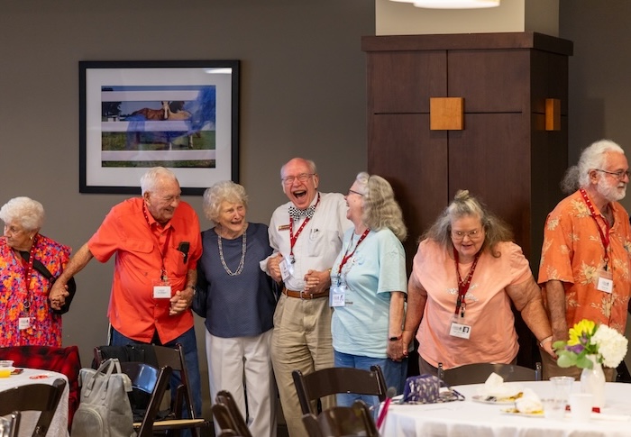 FHU alumni laugh together during the Golden Year Reunion.
