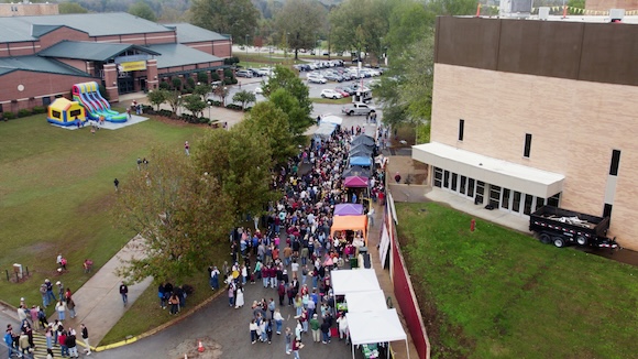 Homecoming crowds enjoy tailgating.