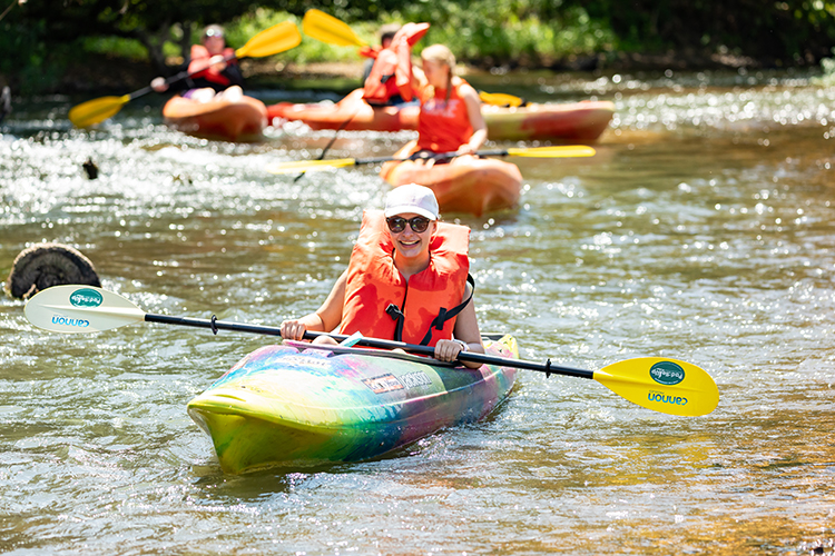 student kayaking on the buffalo river