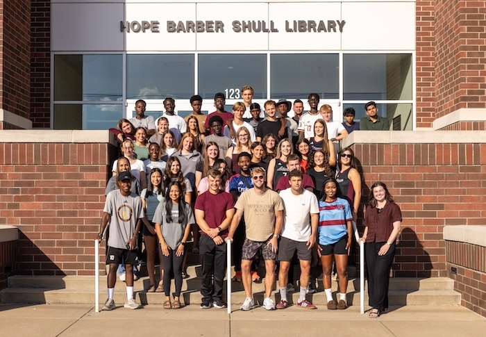 FHU international students outside Hope Barber Shull Academic Resource Center