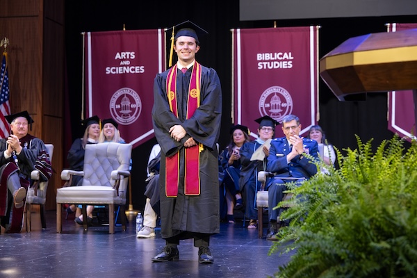 Carson Kizer is awarded FHU's 2026 Faculty Scholarship Leadership Medal.