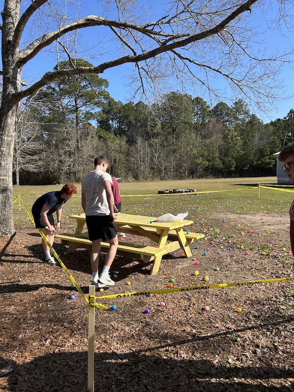 Xi Chi Delta students assist with community easter egg hunt.