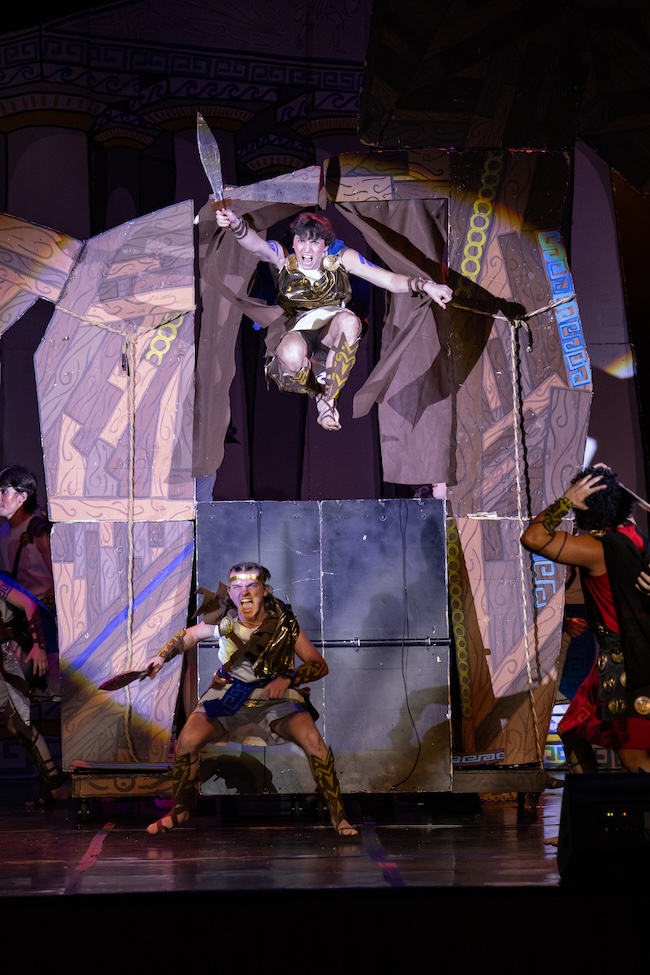 Boy jumping through trojan horse set piece