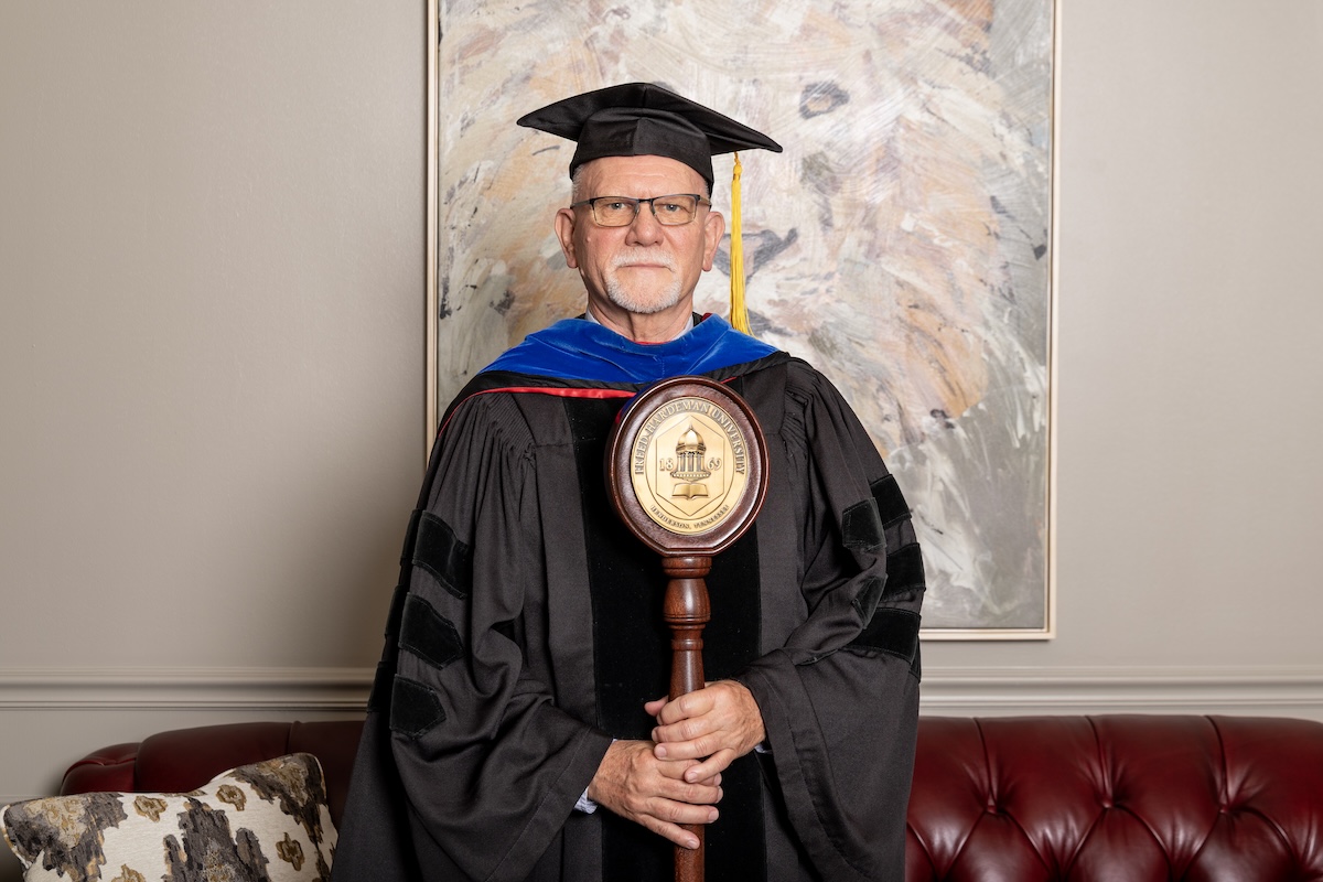 Dr. Paul Fader serving as Bearer of the University Mace at FHU's 2026 spring graduation