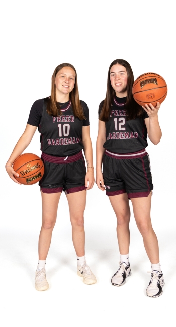 Satterly Sisters photocall photo with them holding basketballs