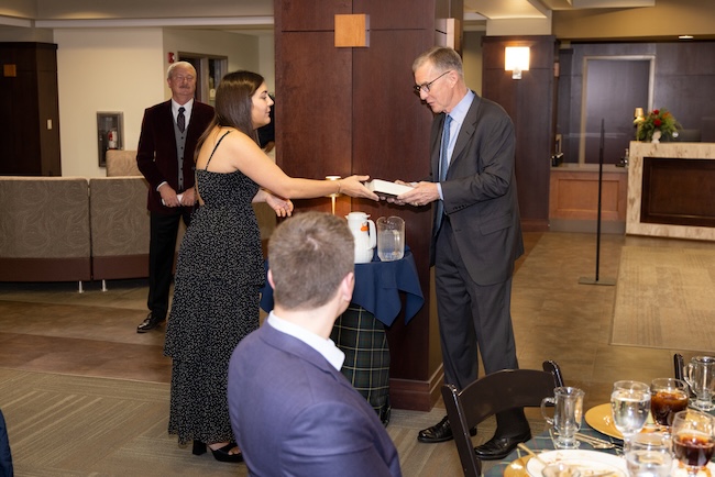 SGA President Birdie Green presents Gen. McChrystal with a Bible
