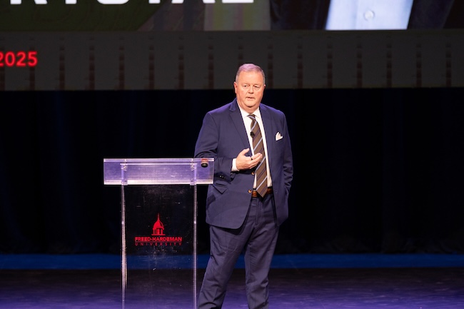 Scott Latham speaks to Benefit Dinner guests