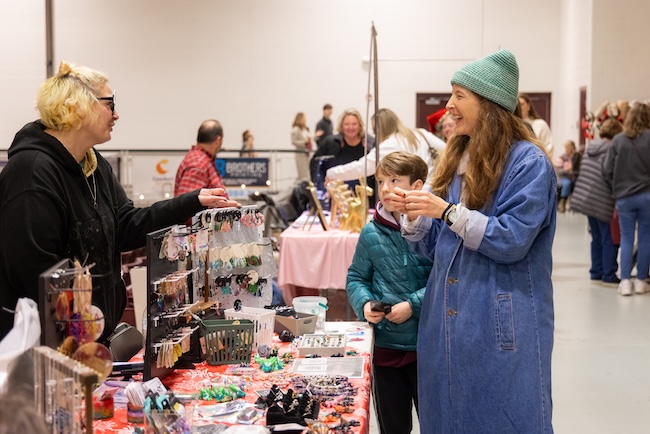 Benefit Dinner guests shop at the Merry Market