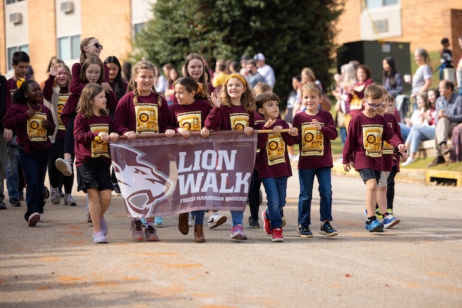 FHU kids take part in the homecoming Lion Walk
