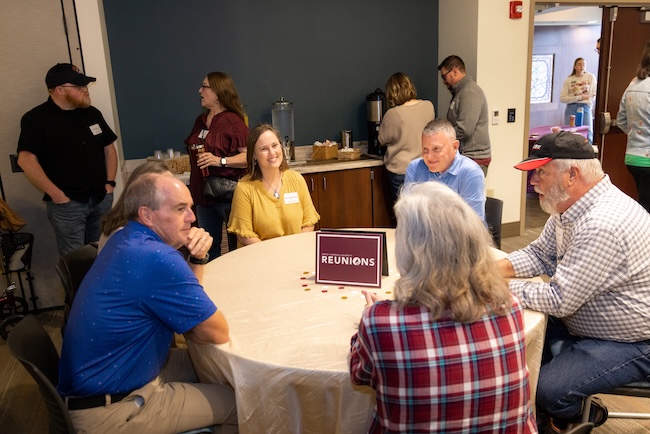 FHU alumni visit during a homecoming brunch