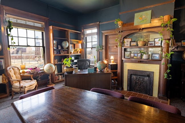 Joy Simon McDaniel House office with fireplace