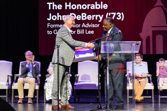 The Honorable John DeBerry recognizes President David Shannon for his years of service during a special chapel ceremony.
