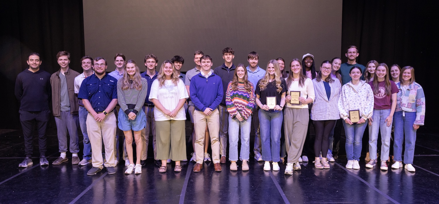 FHU students receive academic awards during chapel in Dryden Auditorium.